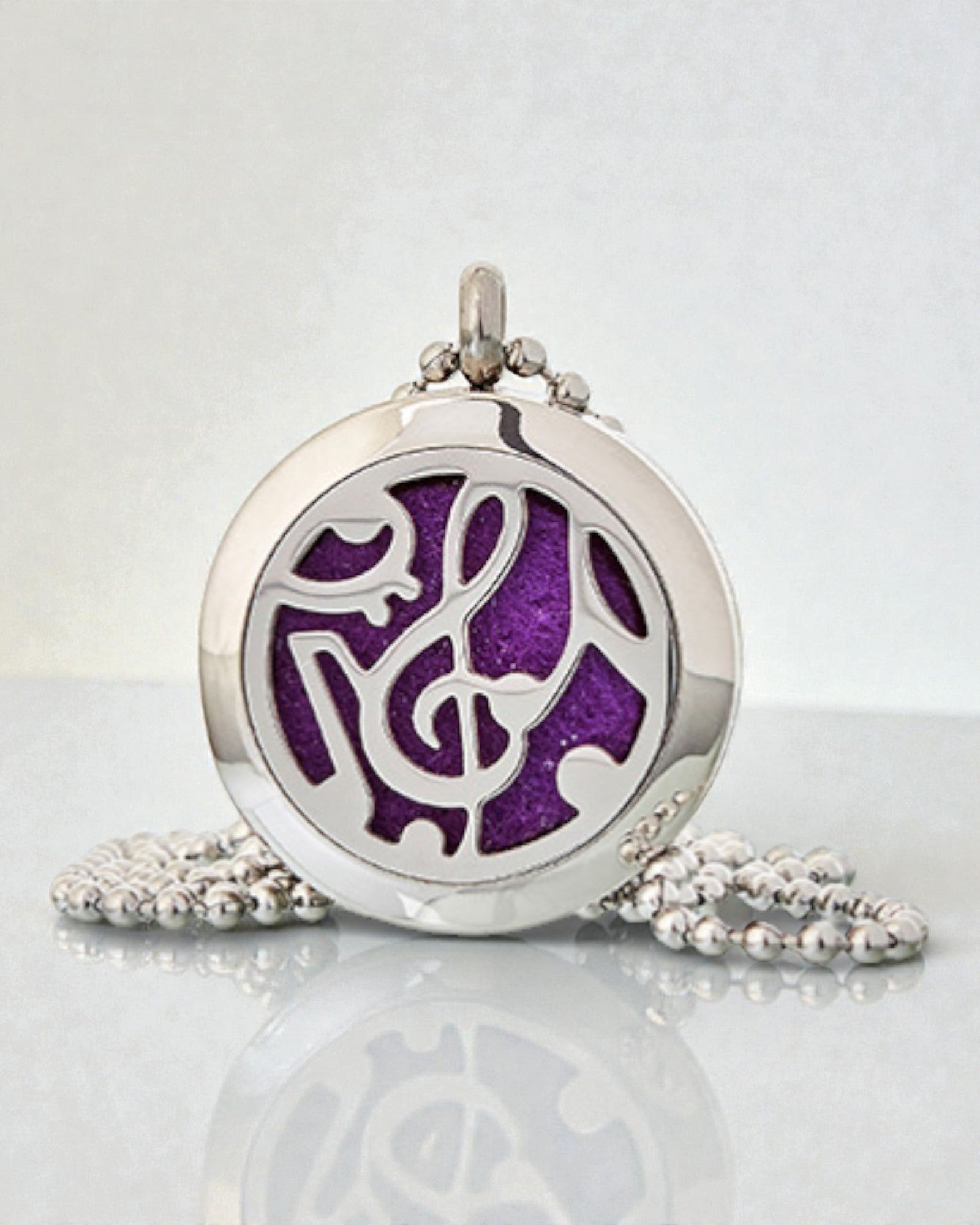 Geurensymfonie – Aromatherapeutische halsketting met muzieknotenmotief 25 mm