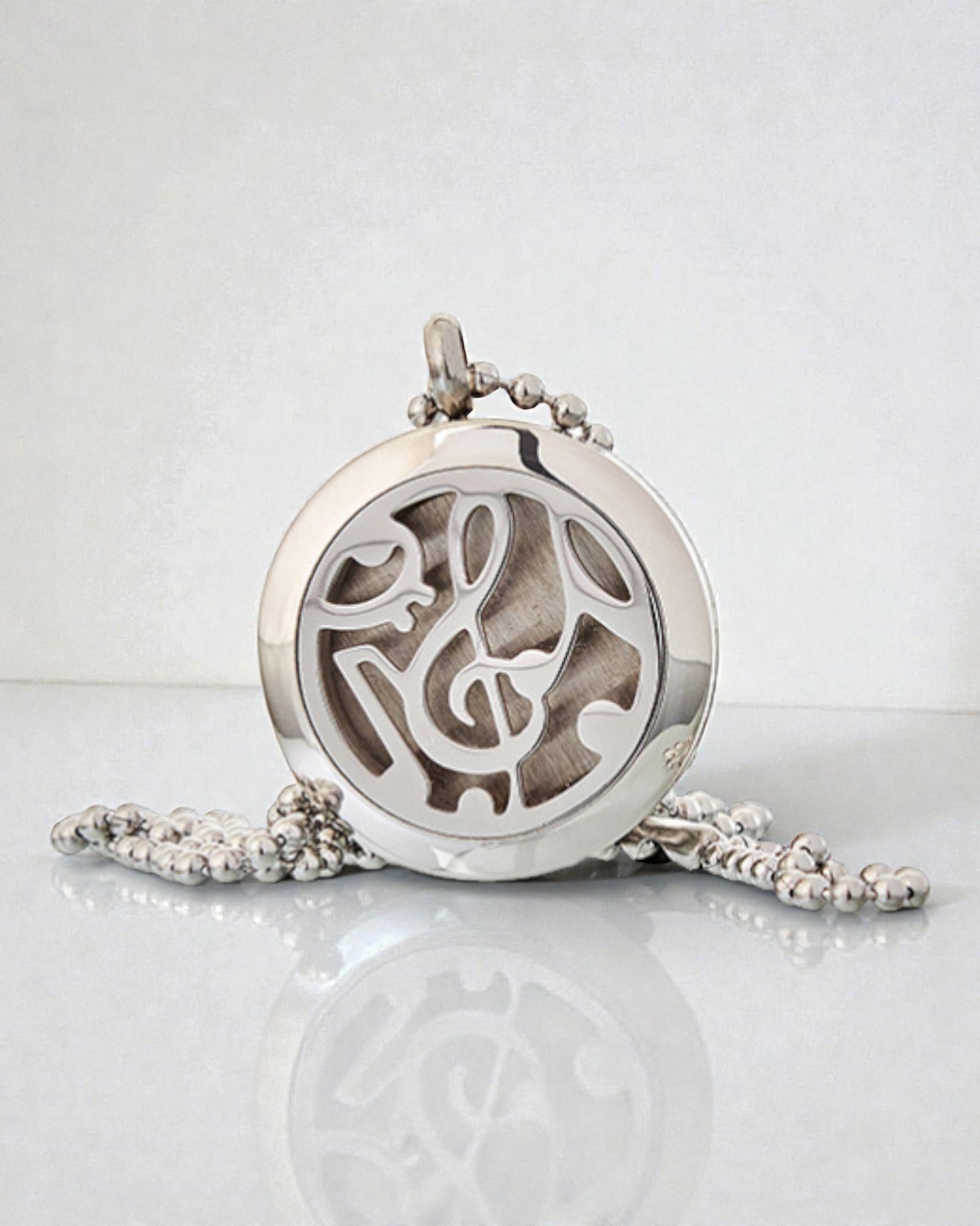 Geurensymfonie – Aromatherapeutische halsketting met muzieknotenmotief 25 mm