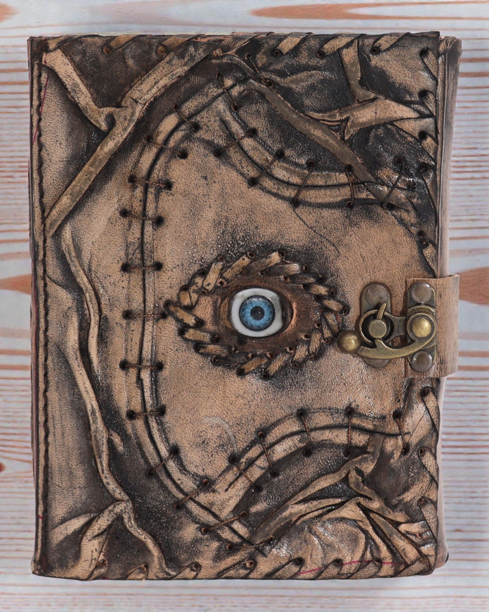 Bruin Leren Notitieboek – Boze Oog – 17 × 12,5 cm | 160 bladzijden, verouderde randen