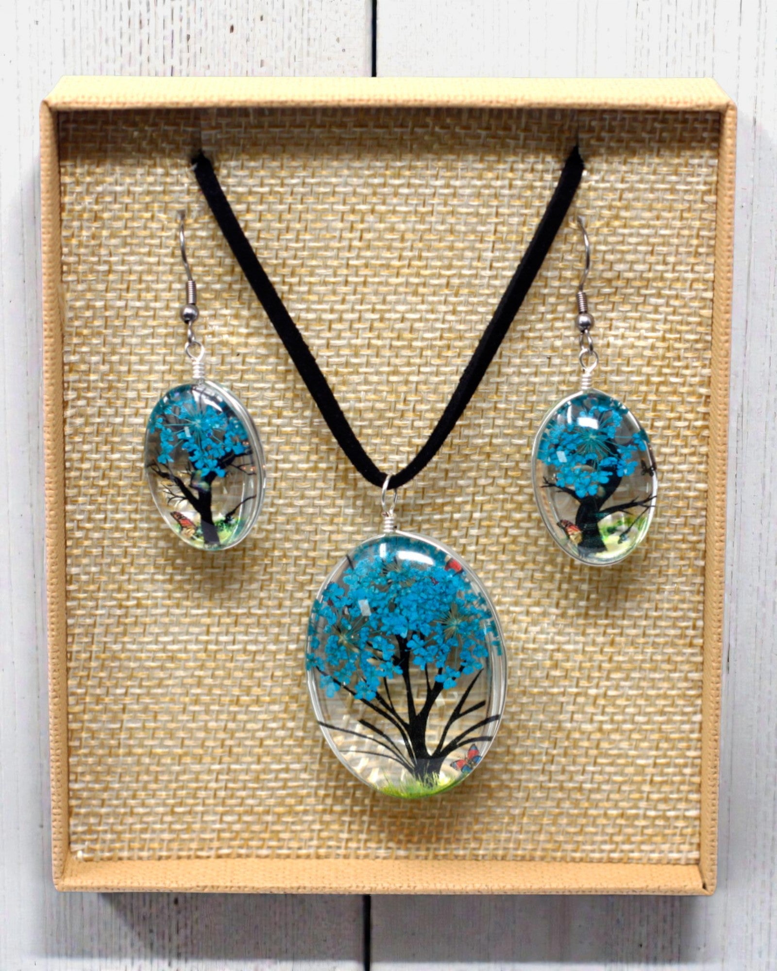 Zeebries – Blauwgroene sieradenset met gedroogde bloemen Levensboom