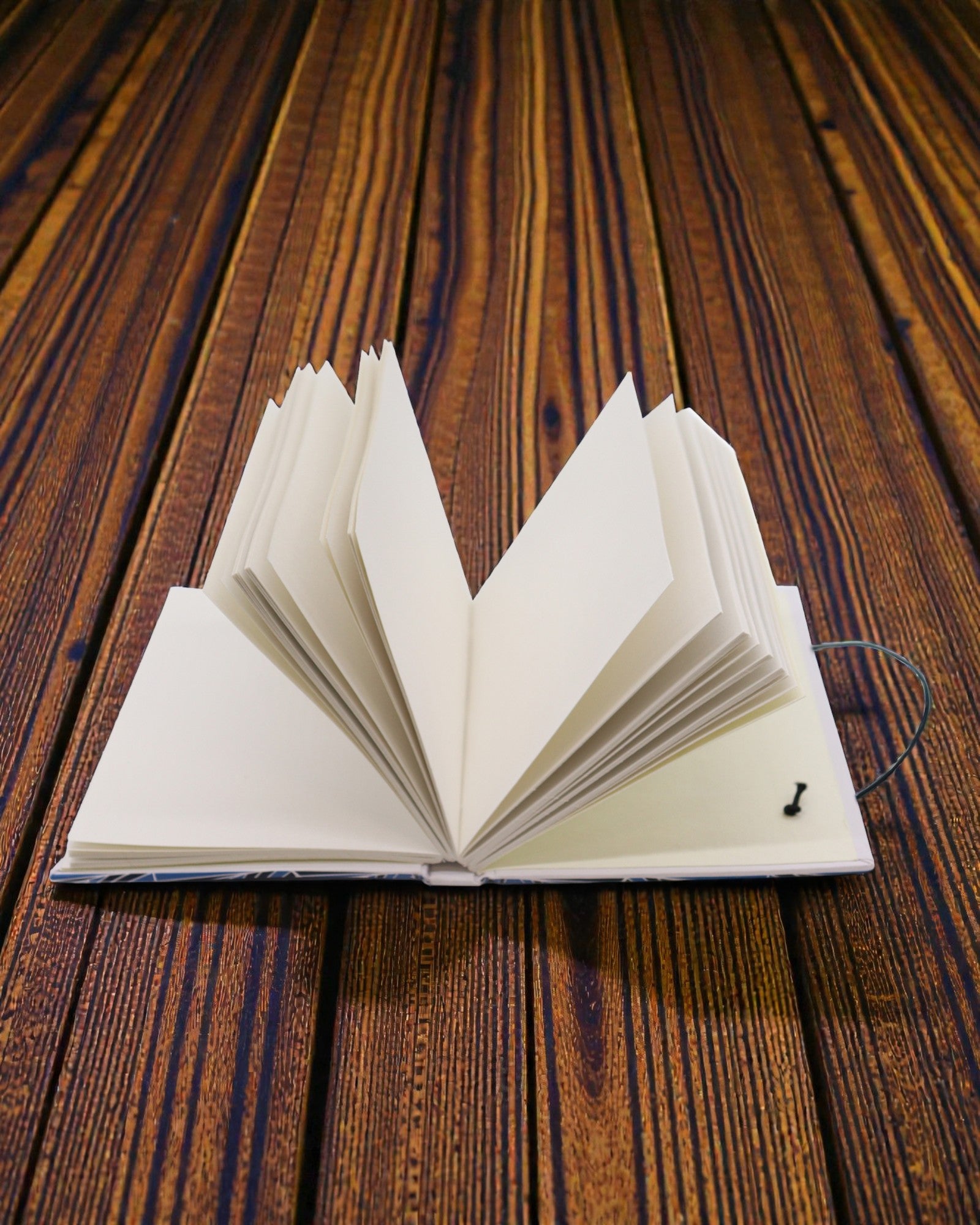 Samen bladeren – klein notitieboekje met riempje en kokosknop 18 × 12,5 cm, 200 pagina's