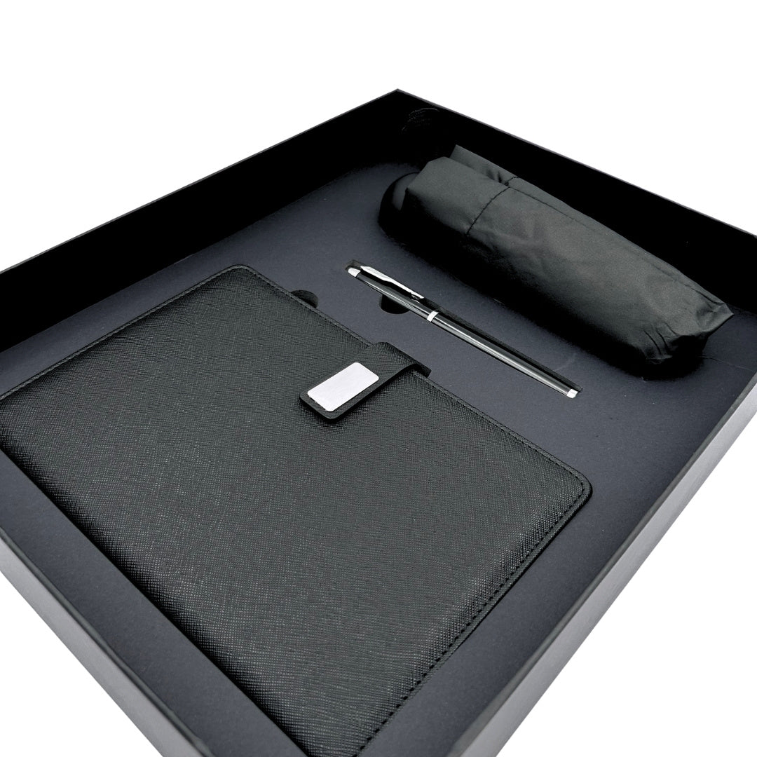 Elegante cadeauset met personalisatie - leren notitieboek A5, pen en zwarte paraplu in geschenkdoos