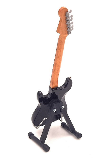 Mini-gitaar geïnspireerd op Kurt Cobain met mogelijkheid tot personalisatie met gravure, handgemaakt van mahoniehout, zwart/wit, hoogte 27,5 cm