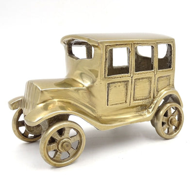Metalen model van een retro BMW Dixi-auto in antiek messingkleur met personaliseerbare gravure