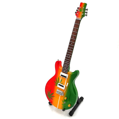 Mini-gitaar Bob Marley Tribute Ganja MGT-0468 met mogelijkheid tot personalisatie met gravure, ideaal cadeau voor reggaefans, handgemaakt van mahoniehout, hoogte 27,5 cm, geel, rood, groen, wit