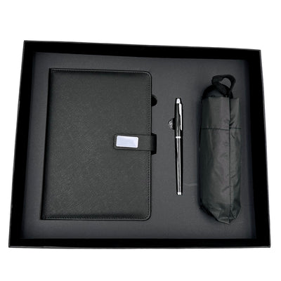 Elegante cadeauset met personalisatie - leren notitieboek A5, pen en zwarte paraplu in geschenkdoos