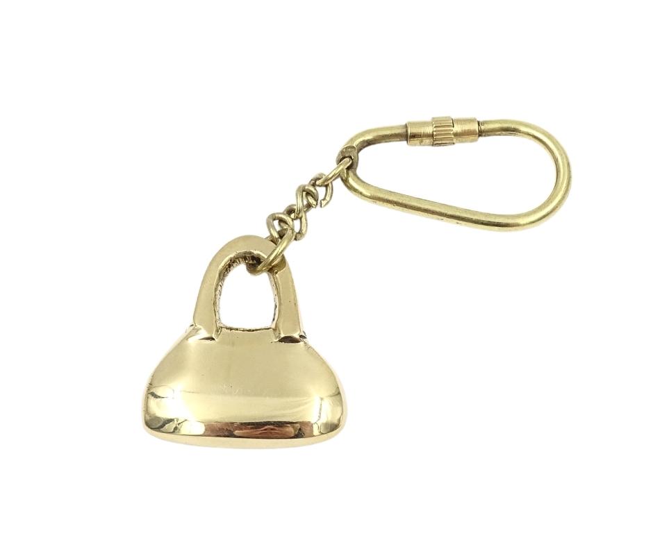 Messing sleutelhanger in de vorm van een handtas met personaliseerbare gravure