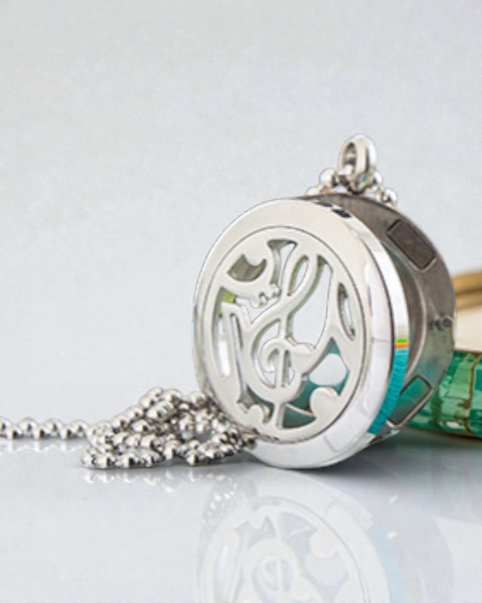 Geurensymfonie – Aromatherapeutische halsketting met muzieknotenmotief 25 mm