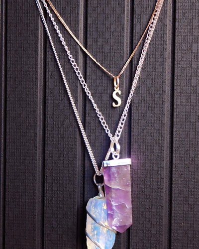 Kristalstraal – Platte hanger van bergkristal in kristalslijping