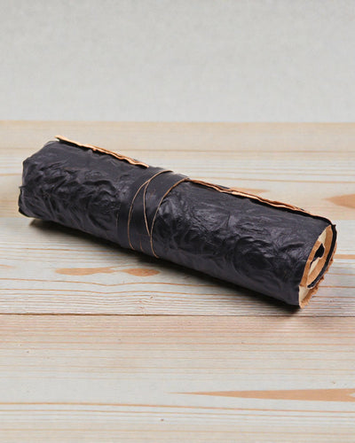 Oprolbaar Leren Reisnotitieboek Nomade Zwart – 21 × 15 cm