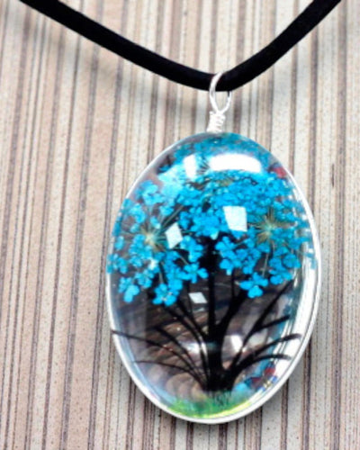 Zeebries – Blauwgroene sieradenset met gedroogde bloemen Levensboom