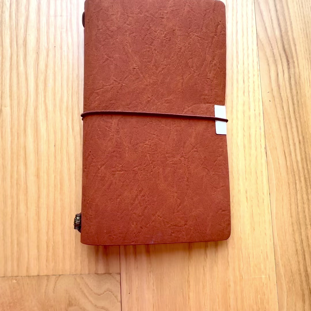 Leren reizigersnotitieboek met gepersonaliseerde gravure
