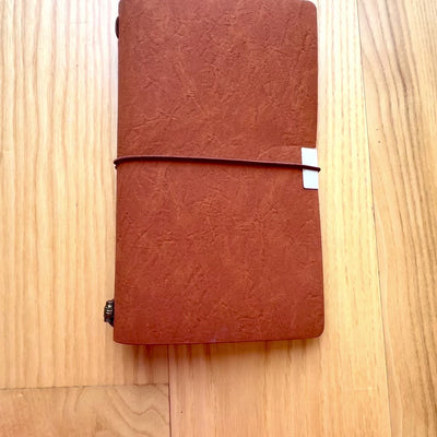 Leren reizigersnotitieboek met gepersonaliseerde gravure